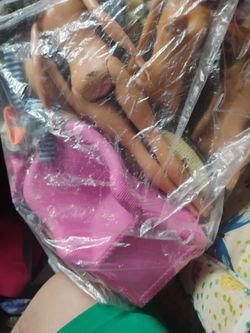 Big bag of barbies,kens,and babys plus clothes ,furniture and shoes!