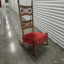 Antique velvet rocking chair 