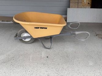 6 cu. ft. Polypropylene Poly Powered Wheelbarrow Flat Free Tire
