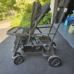 Joovy Caboose Sit and Stand Double Stroller with Rear Bench and Standing Platform