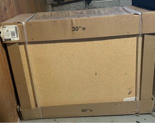 Hampton Bay Hampton Medium Oak 30-inch cabinet. **NEVER OPENED OR USED**