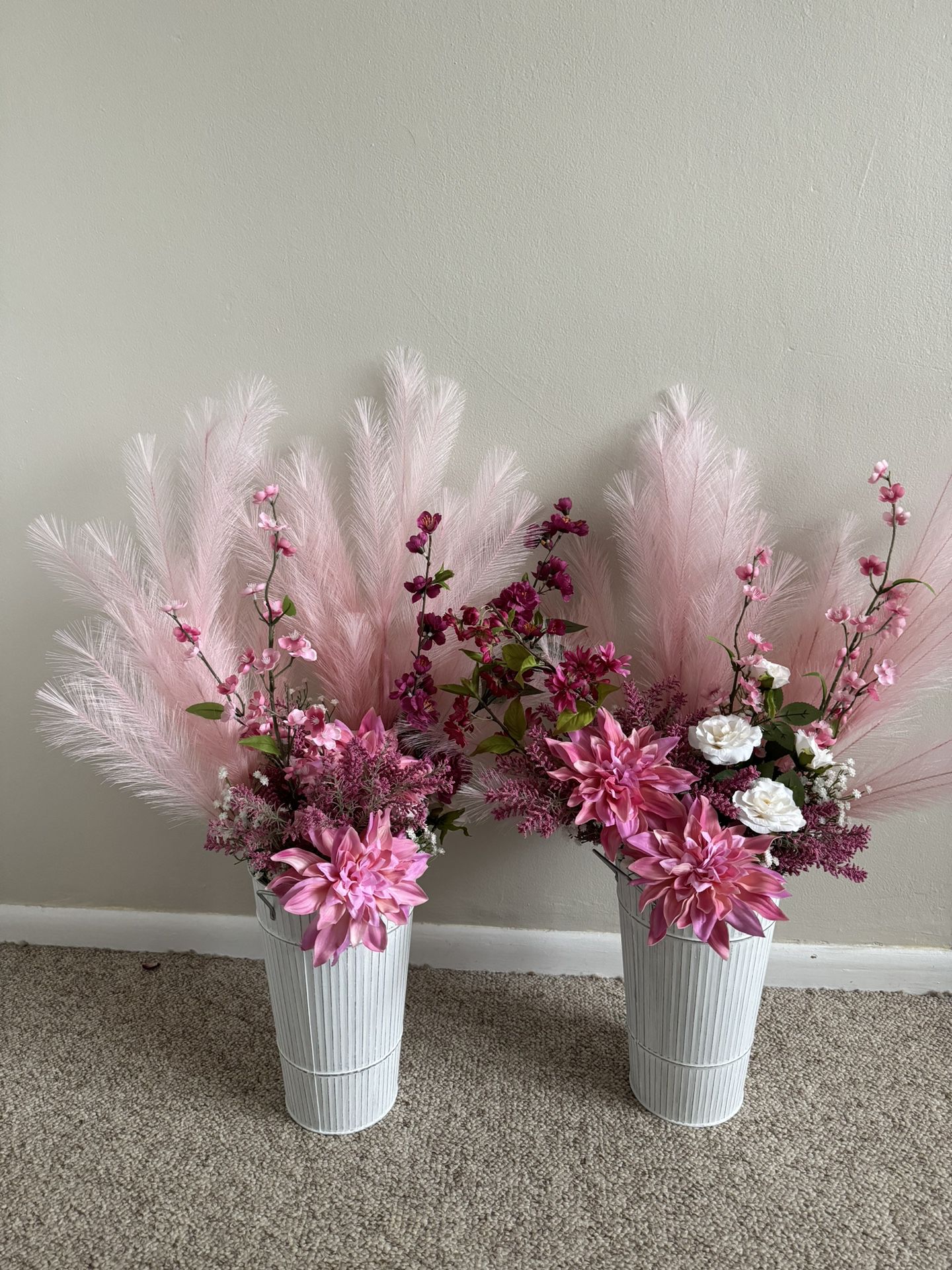 Pink and white silk flowers in vase