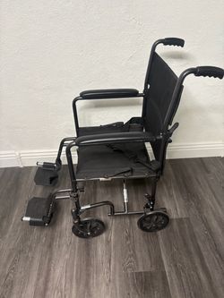 Black Transport Wheelchair with Footrests