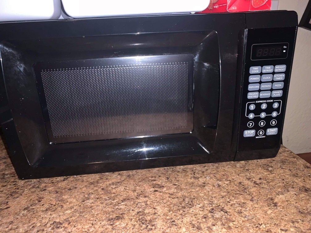 Microwave and small table
