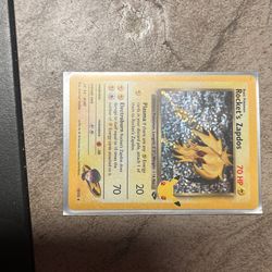 2021 Pokemon Celebrations Classic Rocket’s Zapdos SGC 9.5 Holo #15 plus unopened sleeves,dice, and energys.