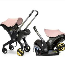 Pink doona stroller used