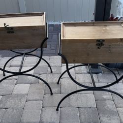 rustic wooden storage boxes on iron stands