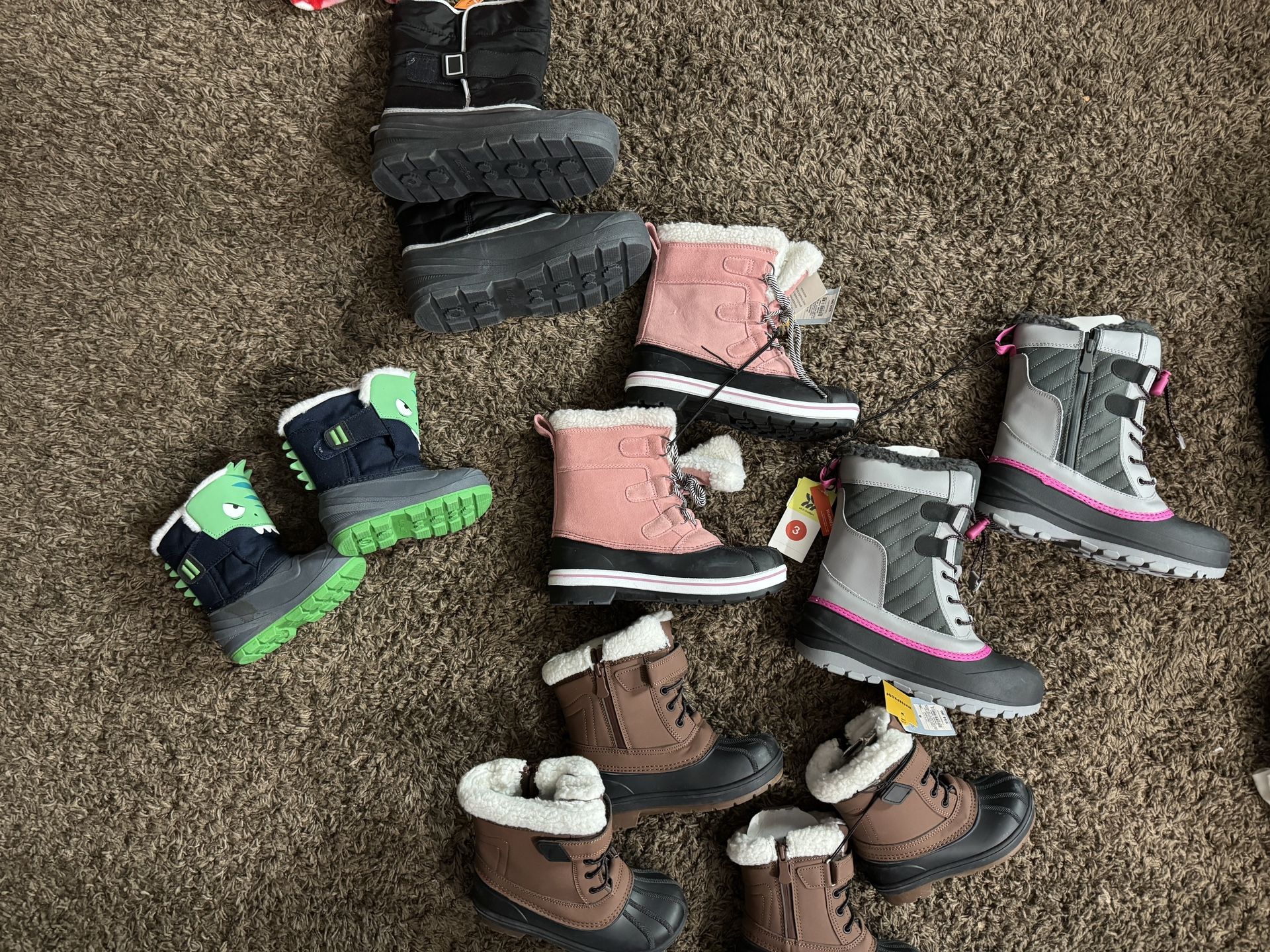 Kids Snow Boots  Check. Description For Sizes  $20 Each 
