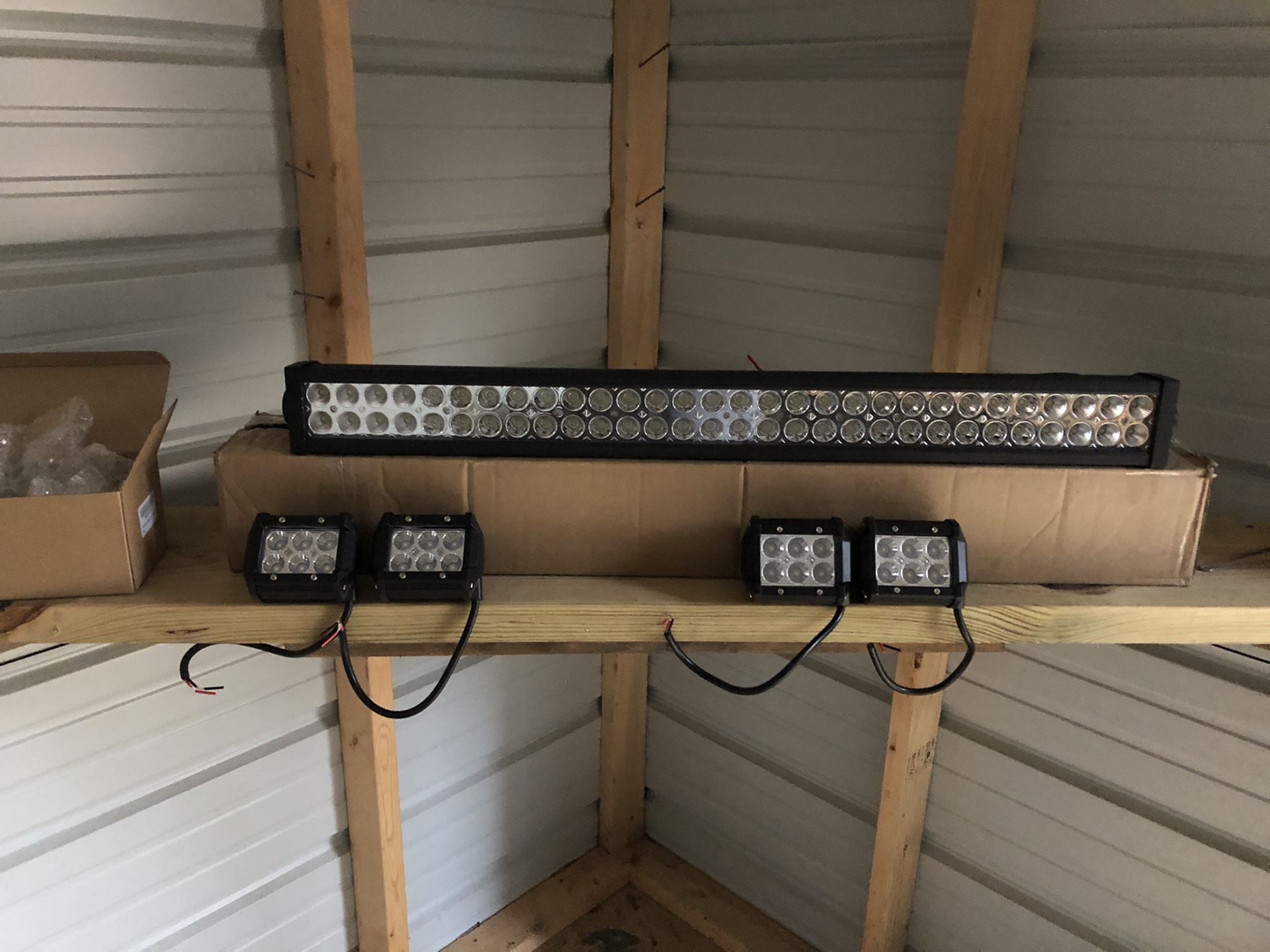 Light bar and four 4” pods with wires and remote with strobes