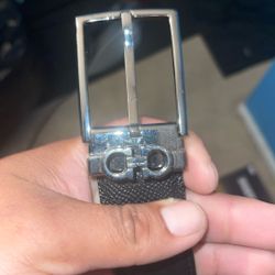 Ferragamo men's reversible leather belt featuring the iconic Gancini buckle. 