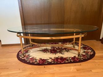 Glass top and gold color coffee table