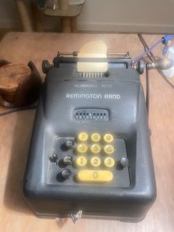 Antique adding machine