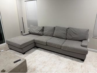 Gray sectional sofa with left facing chaise