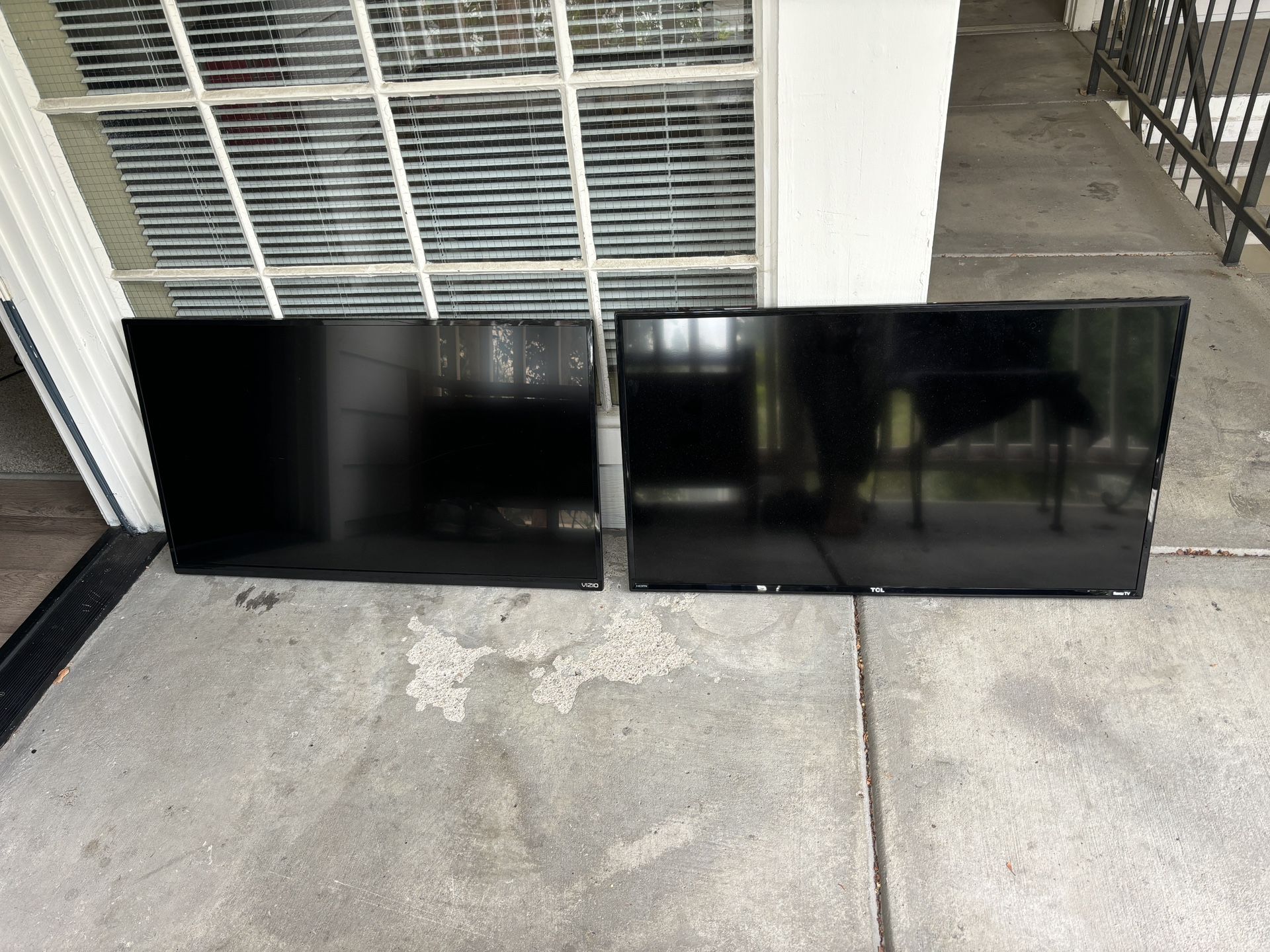 Two TVs - TCL 40” and Vizio 39”