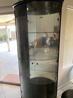 Tall black glass cabinet