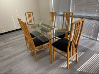 Glass and wood table with 6 chairs. 6ft x 3.5ft