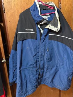 Columbia men's winter jacket in blue and black.