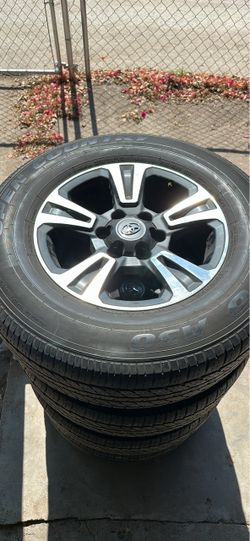 Toyota OEM Wheels with Toyo Open Country Tires