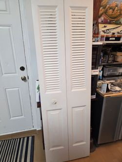 Metal Bi fold Closet doors