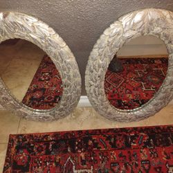 Two Silver Leafed Oval Mirrors 