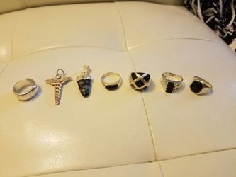 Authentic 925 Sterling Silver Rings Size 8 & two pendants. Rings is $60 each and Pendants $40 each FIRM PRICE! Lawrenceville Ga