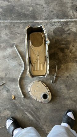Sbc 350 timing cover, oil pan, transmission dipstick and oil dipstick all chrome. Timing cover is aluminum cast