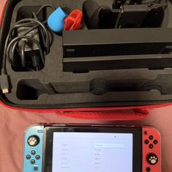 lightly used nintendo switch + accessories and box