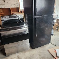 Insignia Fridge And Amana Stove 