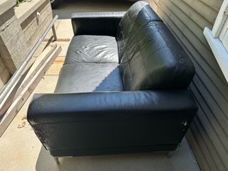 FREE: Black faux Leather Two-Seat Sofa
