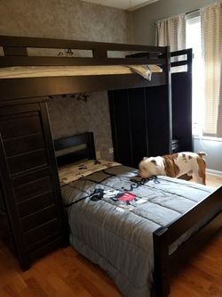 Bunk bed with chest cabinet and step storage