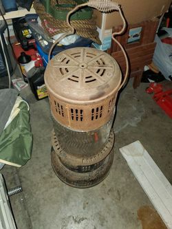 Antique vintage heater w glass mid section. Used as lamp in pintrest decor outdoor and indoor