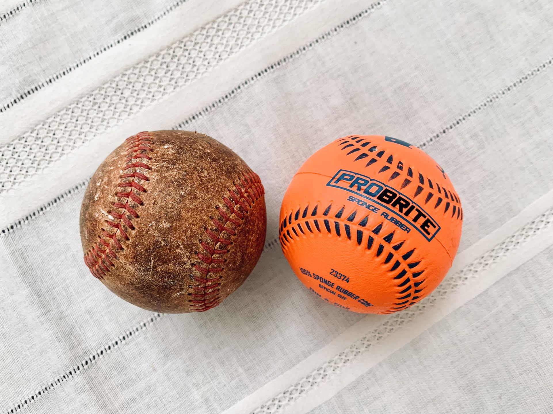 PROBRITE Neon Orange Sponge Rubber Baseball & A Regular Leather Baseball 