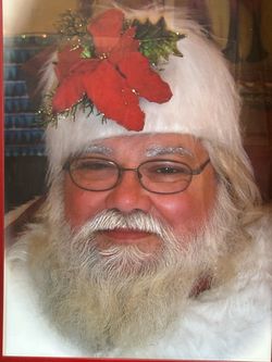 Two large framed Santa pictures
