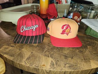 Hats. New Era and Mitchell and Ness