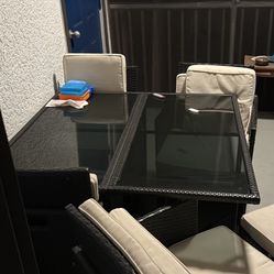 Glass table with seating for up to 8 people
