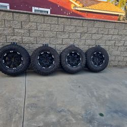 RIMS AND TIRES  35X12.50R18LT $1200