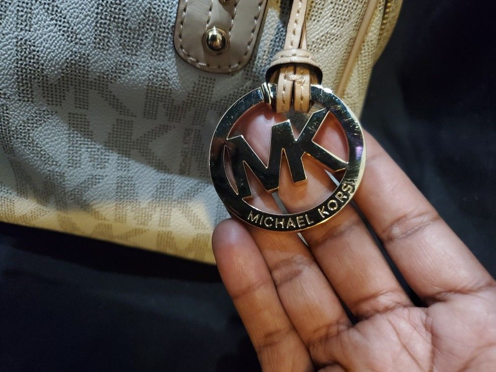 MIchael Kors logo bronze metallic doctor's bag, $328 at Dillards