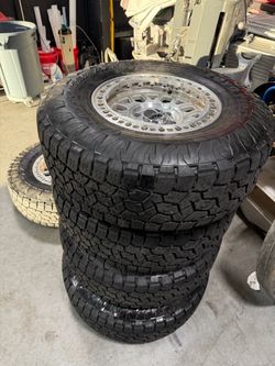 5 KMC Grenade Beadlock Rims with Toyo open country at3