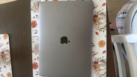 Apple MacBook Model number: A1932 Screen size: 13.3-inch Color: grey Year: 2018 or 2019