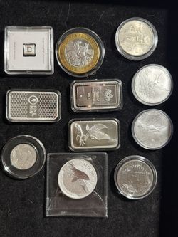 Silver Coins And Bars