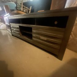 Your Choice Of Tv Stands-These Are Classy And Quality-Also-two piece sectional with rollout sleeper and storage under the lounge chair part