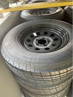 Brand new 205/75R15 Tire on 5-Lug Rim