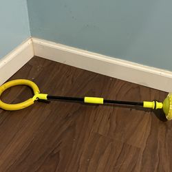 Yellow Skip Ball Toy and scooter