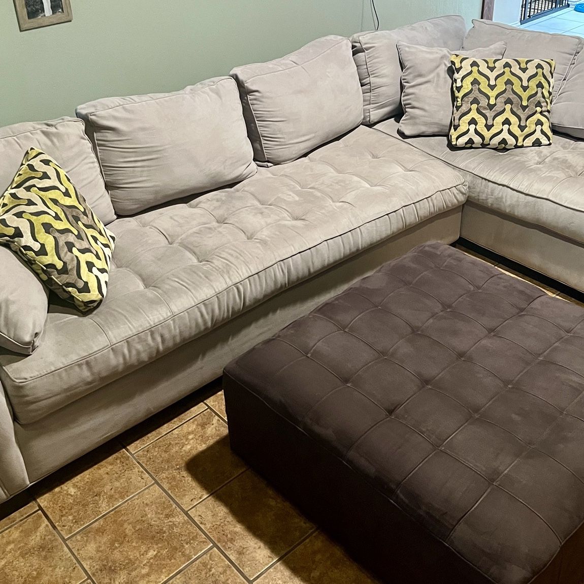 Light Gray Two-piece Sectional & Ottoman