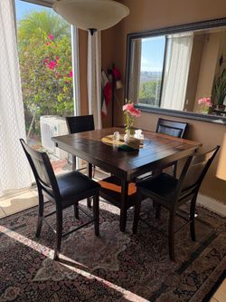 Dining table with spinning center & chairs