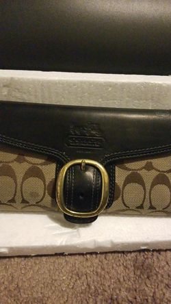 Coach signature and leather buckle wallet