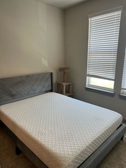 Gray Upholstered Bed Frame with Mattress