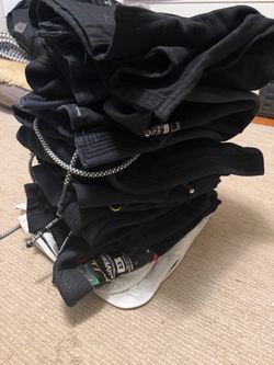 Stack of Jiujitsu Gi’s BJJ A3