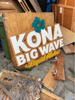 Sign for someone’s business Kona Big wave liquid aloha