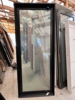 Black glass door 38”1/2x93”1/2 swing in